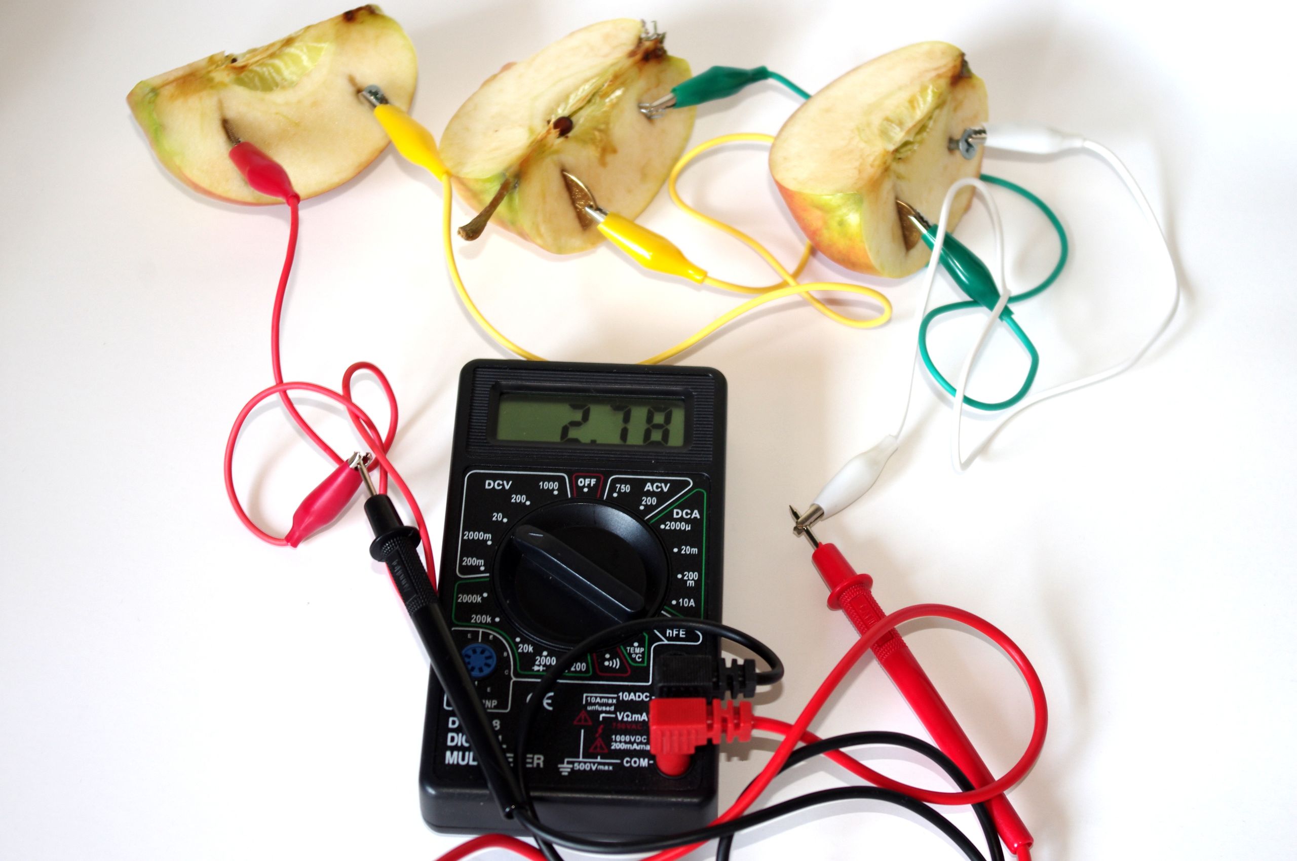 Battery made from fruit! Each piece of apple with the coin and screw is a cell. They connect together to make a battery.